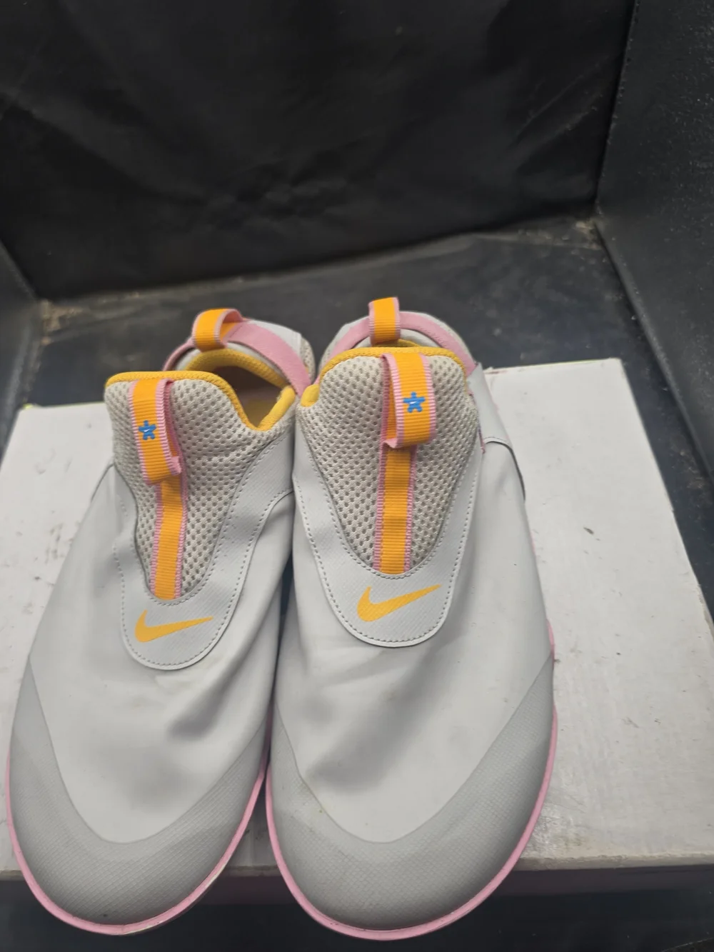 Nike Light Gray Slip-On Sneakers with Pink‎ and Yellow Accents